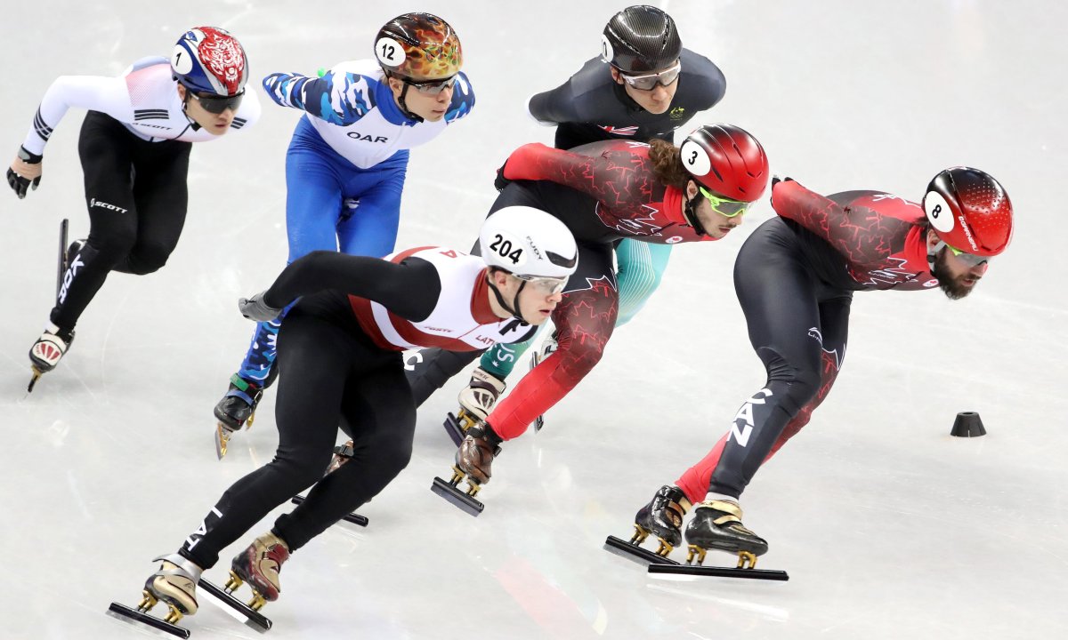 Charles Hamelin (R) and Samuel Girard (2-R) of Canada in action during the Men's Short Track Speed Skating 1500 m competition at the Gangneung Ice Arena during the PyeongChang 2018 Olympic Games, South Korea, 10 February 2018. 