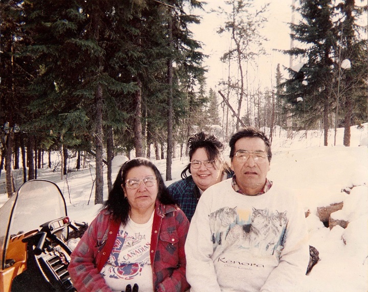 Ina Matawapit, centre, with her parents Edward and Madeline Matawapit, are seen in an undated handout photo. An inquest probing the circumstances surrounding the 2012 death of an Ontario Indigenous woman is recommending stricter protocols for handling intoxicated patients. Jurors at the inquest heard that Ina Matawapit died in police custody after being turned away from the nursing station in her home community of North Caribou Lake First Nation in northwestern Ontario. 