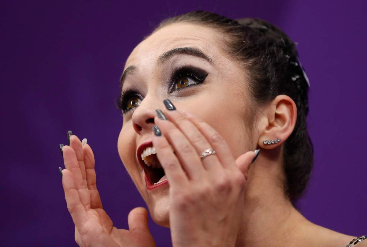 Kaetlyn Osmond of Canada reacts as her scores are posted following her performance in the women’s free figure skating final in the Gangneung Ice Arena at the 2018 Winter Olympics in Gangneung, South Korea, Friday, Feb. 23, 2018.