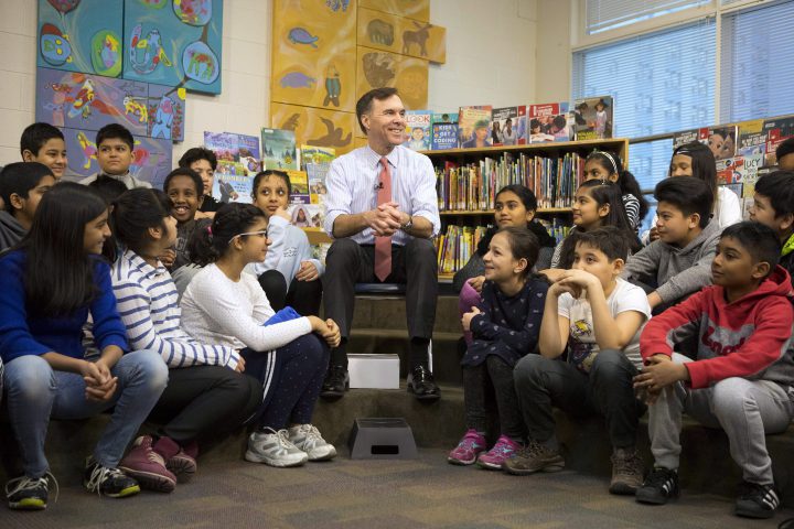 Federal Finance Minister Bill Morneau speaks with students from Toronto’s Rose Avenue Junior Public School.