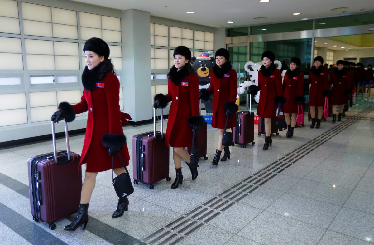 North Korean cheering squads arrive at the Korean-transit office near the Demilitarized Zone in Paju, South Korea, February 7.
