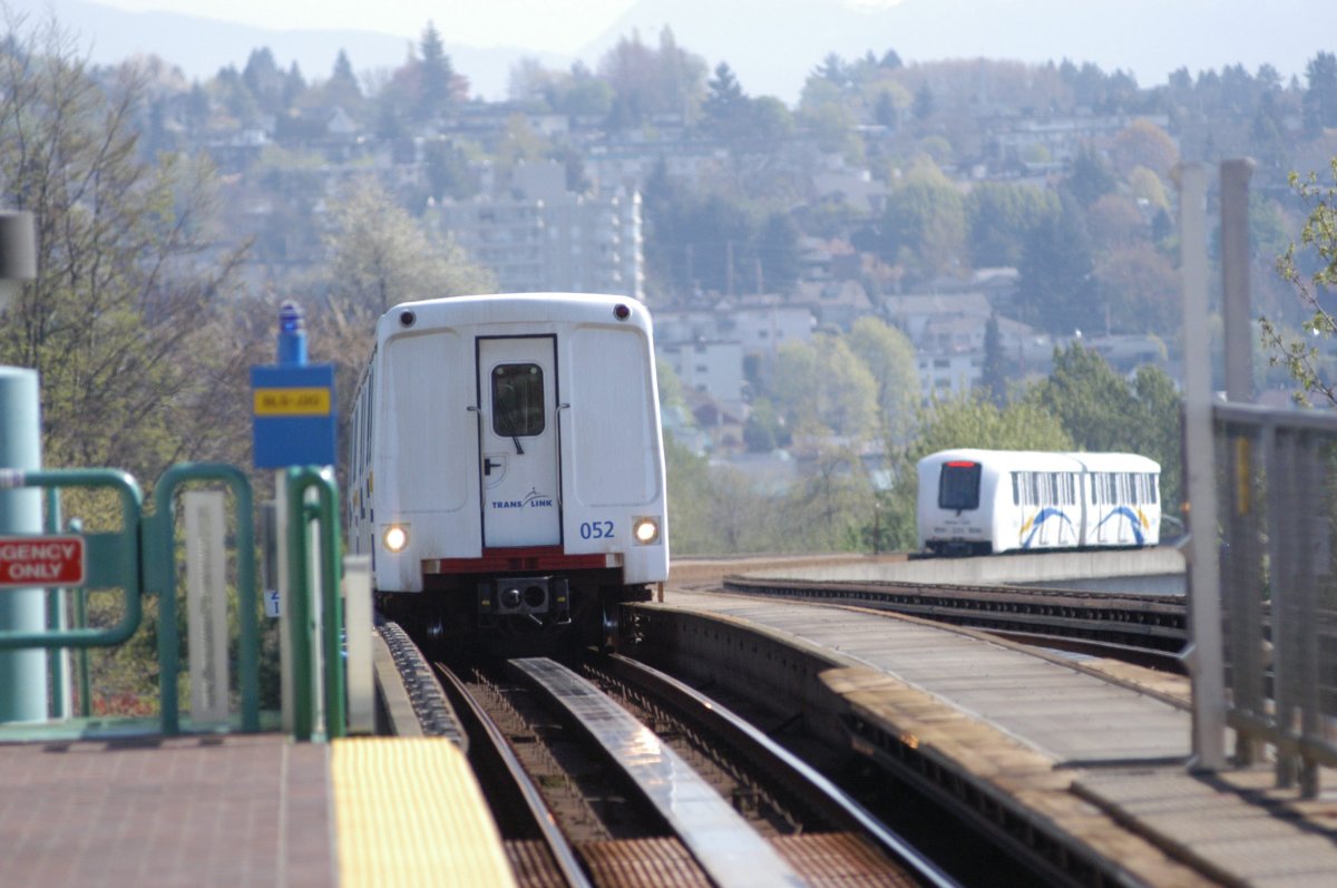A Skytrain approaches the New West station on its way to downtown Vancouver while another train leaves for Burnaby.
