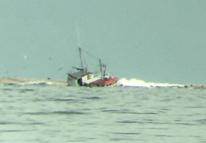 The Fisherman’s Provider II can be seen where it has run aground just near Canso, N.S.