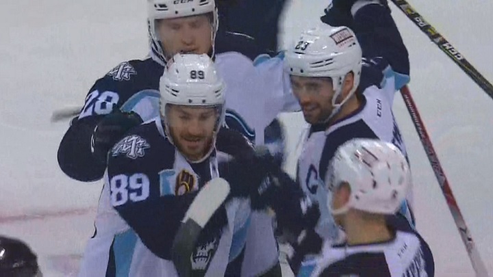The Milwaukee Admirals celebrate their third goal of the opening period in their win over the Manitoba Moose on Monday.