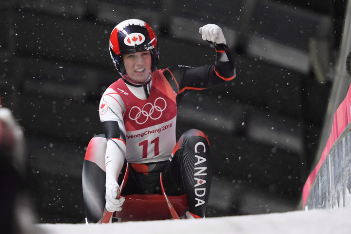 Canadian luger Alex Gough, of Calgary, reacts after her first run in the women’s luge at the Pyeongchang 2018 Winter Olympic Games in South Korea, Tuesday, Feb. 13, 2018.
