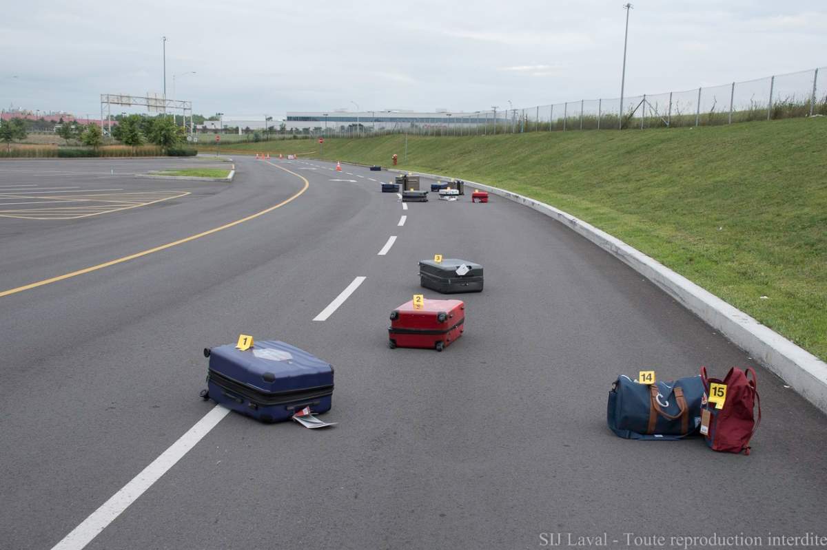 The discovery of 15 pieces of stolen luggage strewn over a mall parking lot led Laval police to two arrests.