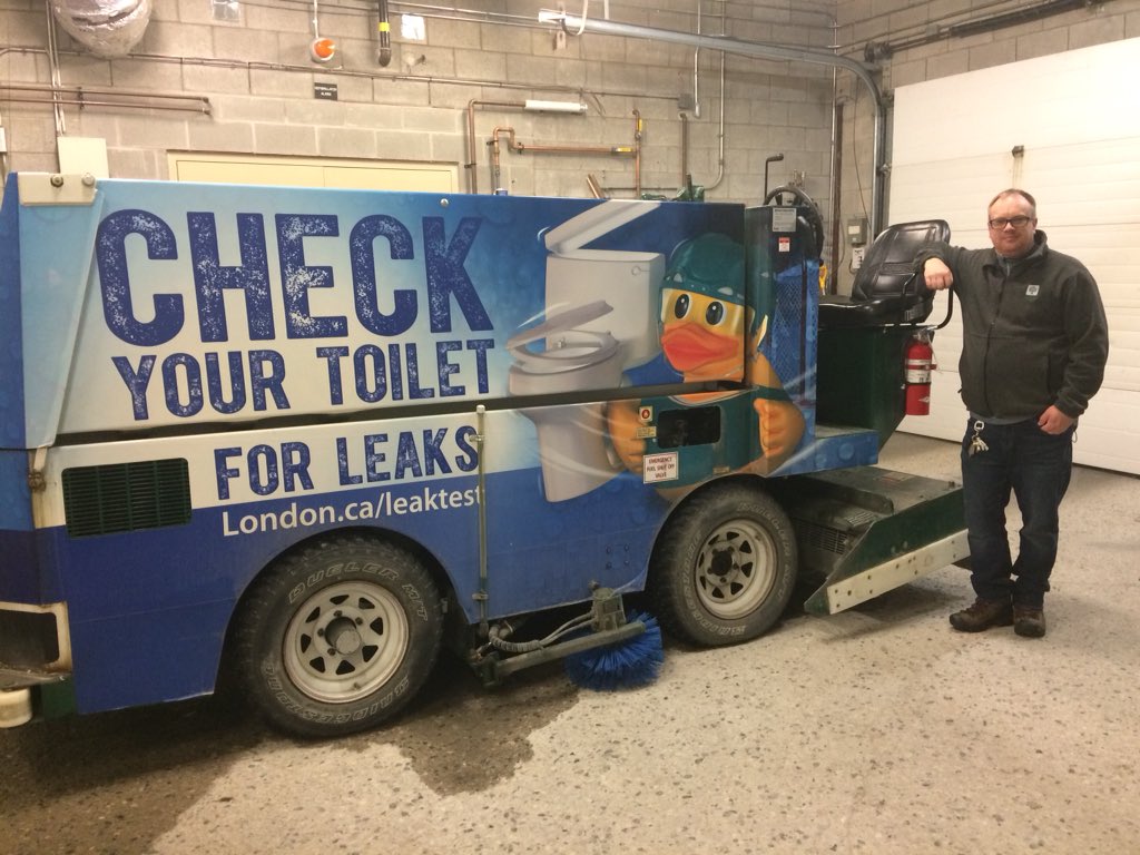 Art Johnston, 46, stands with the Zamboni he uses at the Earl Nichols Arena in  London. He'll be traveling to Pyeonchang on Sunday. 