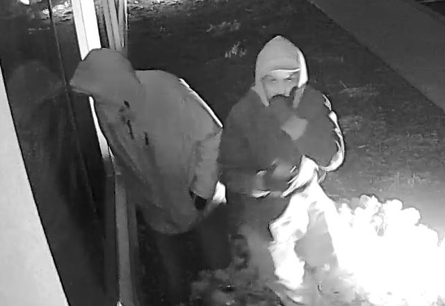 Video surveillance of two suspects breaking into a business in east London. Police are looking for both men.