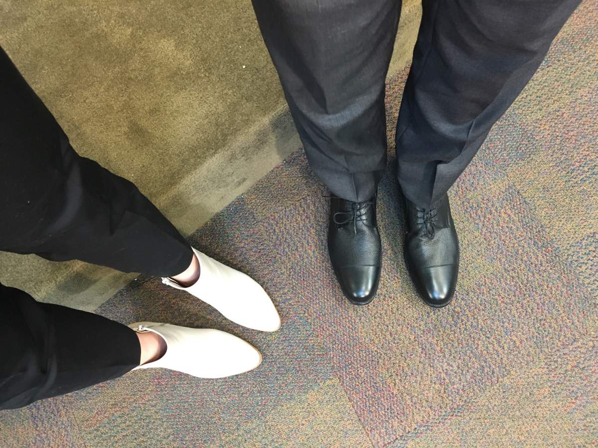 Bill Morneau, left, standing with Poppy Barley co-founder Kendall Barber in Toronto. February 23, 2018.