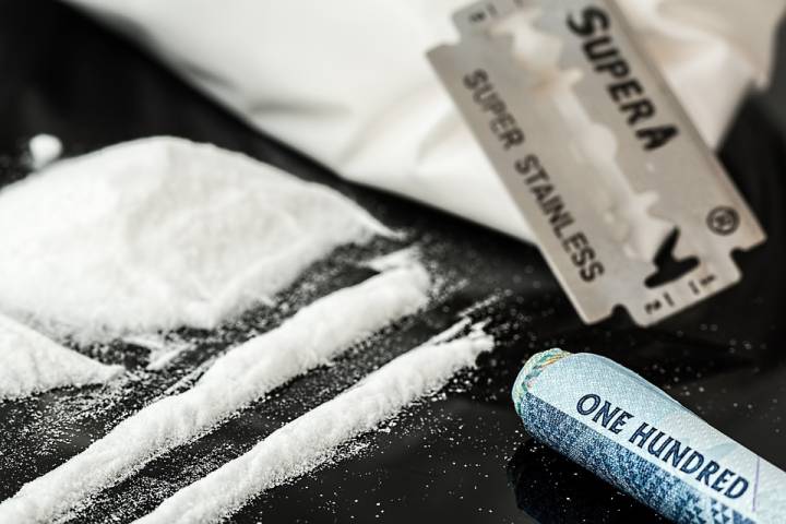 Cocaine, weapons and cash were seized during two drug raids in Quinte West this week.