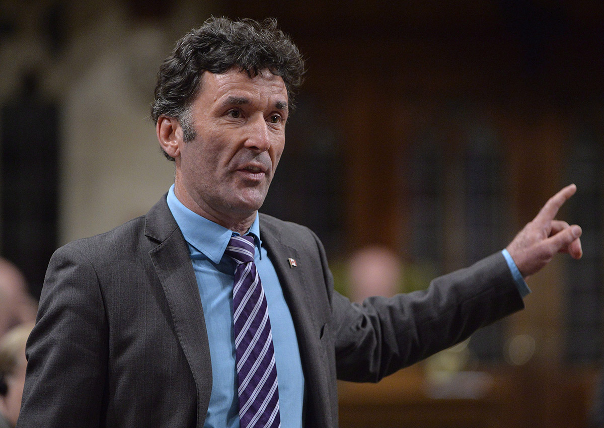 NDP MP Paul Dewar asks a question during Question Period in the House of Commons in Ottawa on September 29, 2014. 