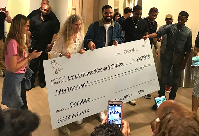 Lotus House shared an image of Drake speaking to its residents and a message of gratitude.