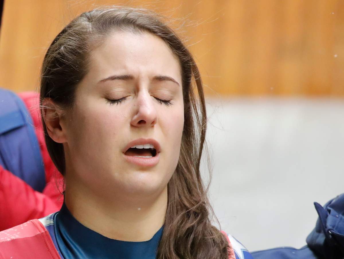 Emily Sweeney of the U.S. reacts after crashing along Curve 9.