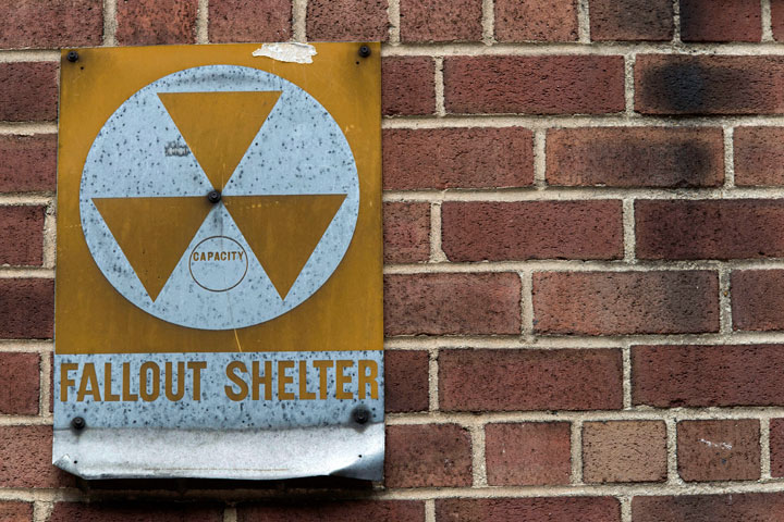 In this Tuesday, Jan. 16, 2018 photo, a fallout shelter sign hangs on a building on East 9th Street in New York.