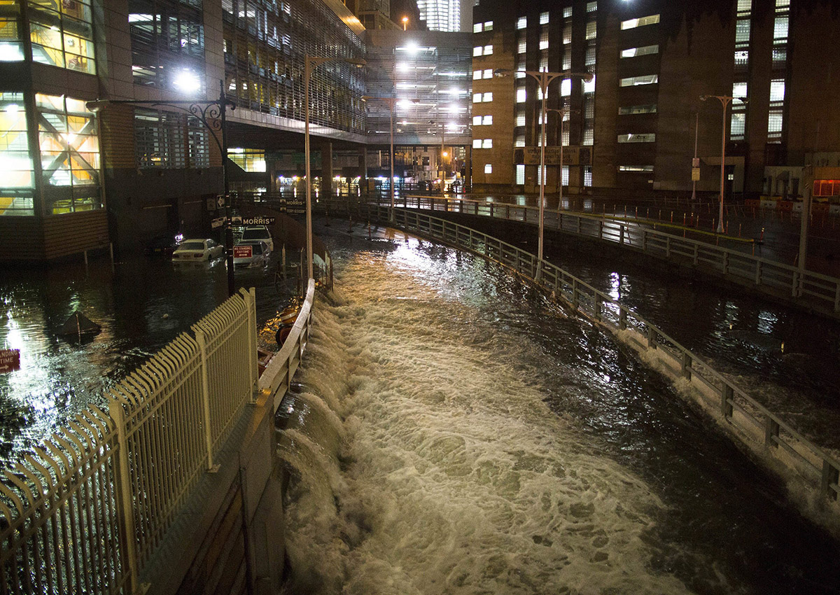  In this Oct. 29, 2012, file photo, seawater floods the entrance to the Brooklyn Battery Tunnel in New York in the wake of Superstorm Sandy.