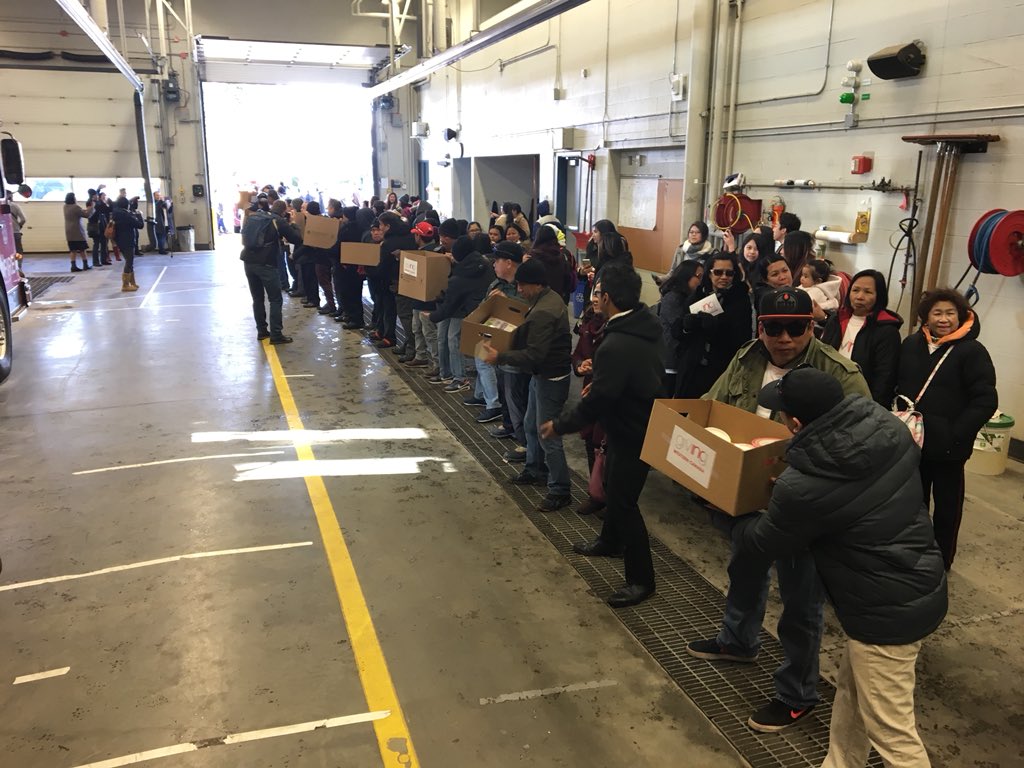 Hundreds of volunteers have put their energy towards providing a massive donation to the Edmonton Food Bank, Sunday, Feb. 18, 2018. 