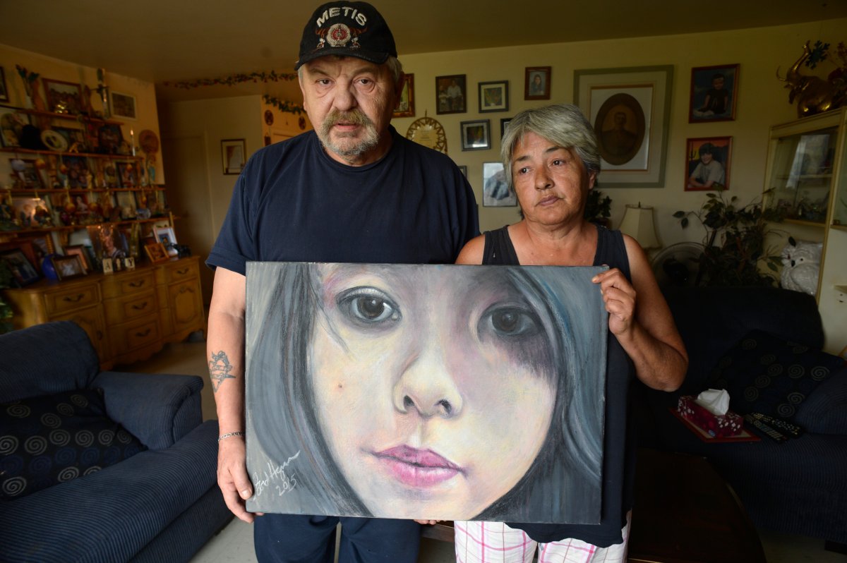 WINNIPEG, MB - SEPTEMBER 9: Joe and Thelma Favel and a framed collage tribute to their niece, Tina Fontaine, who was murdered and her body dumped in the Red River.        (Jim Rankin/Toronto Star via Getty Images).