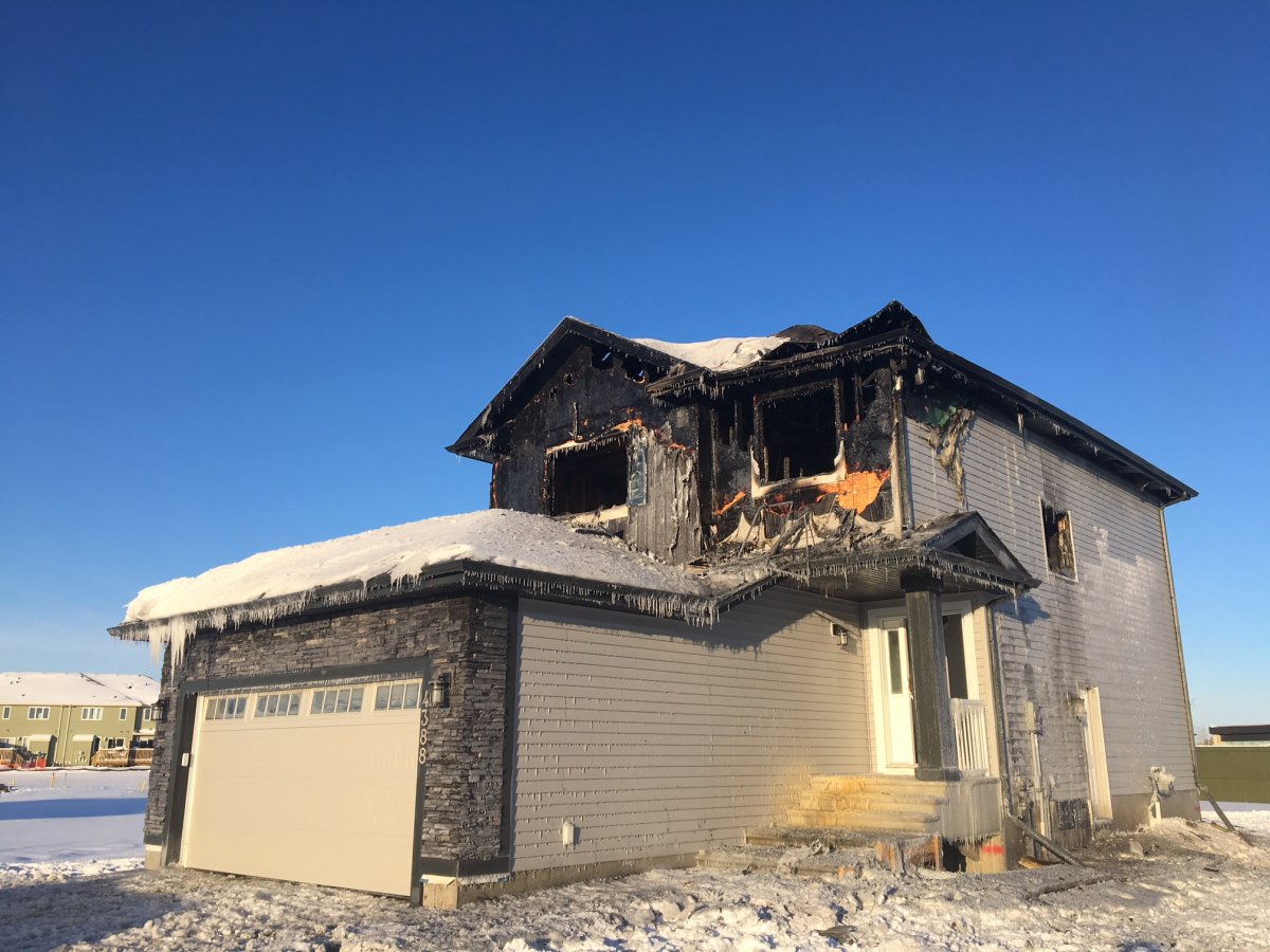 A home at 4388 126B Ave. in northeast Edmonton's Homesteader neighbourhood was damaged by fire early Tuesday morning. Feb. 6, 2018.