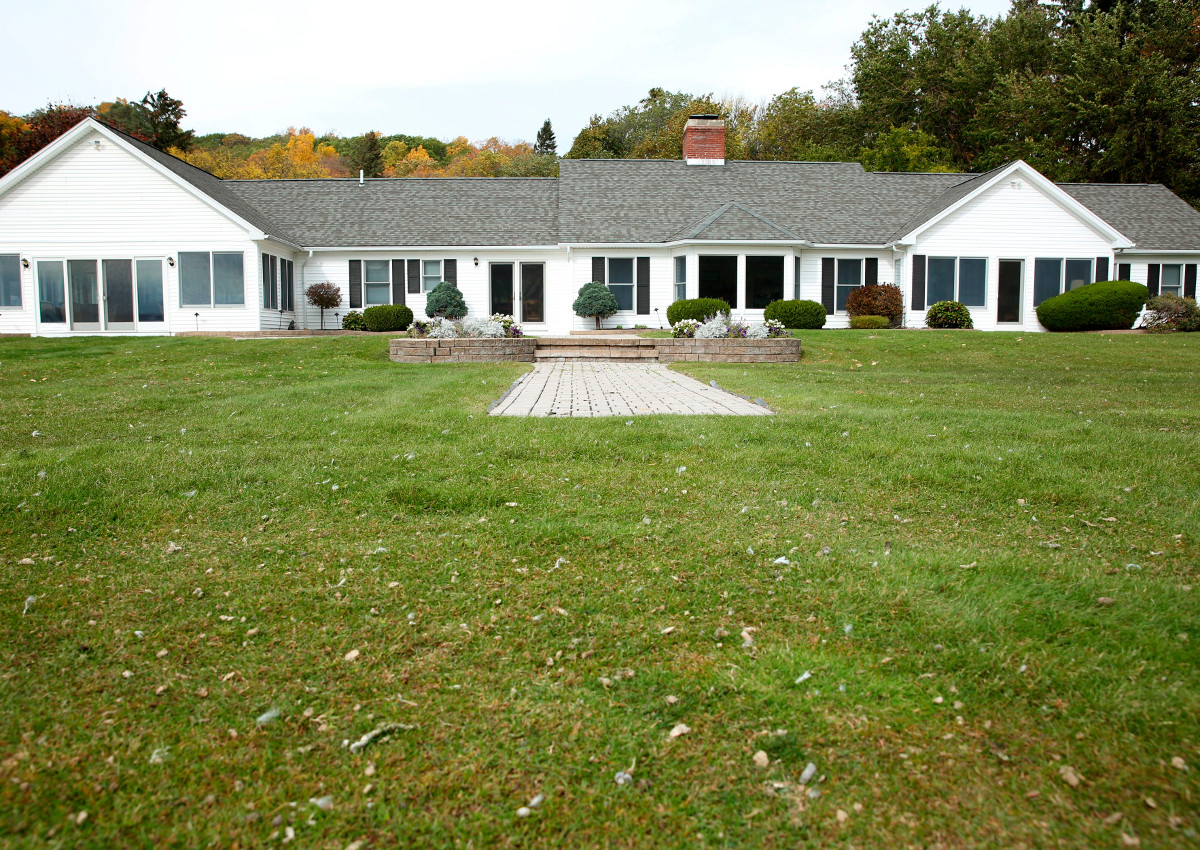 In this Oct. 23, 2017 photo, the front lawn of billionaire businessman and philanthropist Tom Golisano's summer home on Canandaigua Lake in South Bristol, N.Y, is shown.