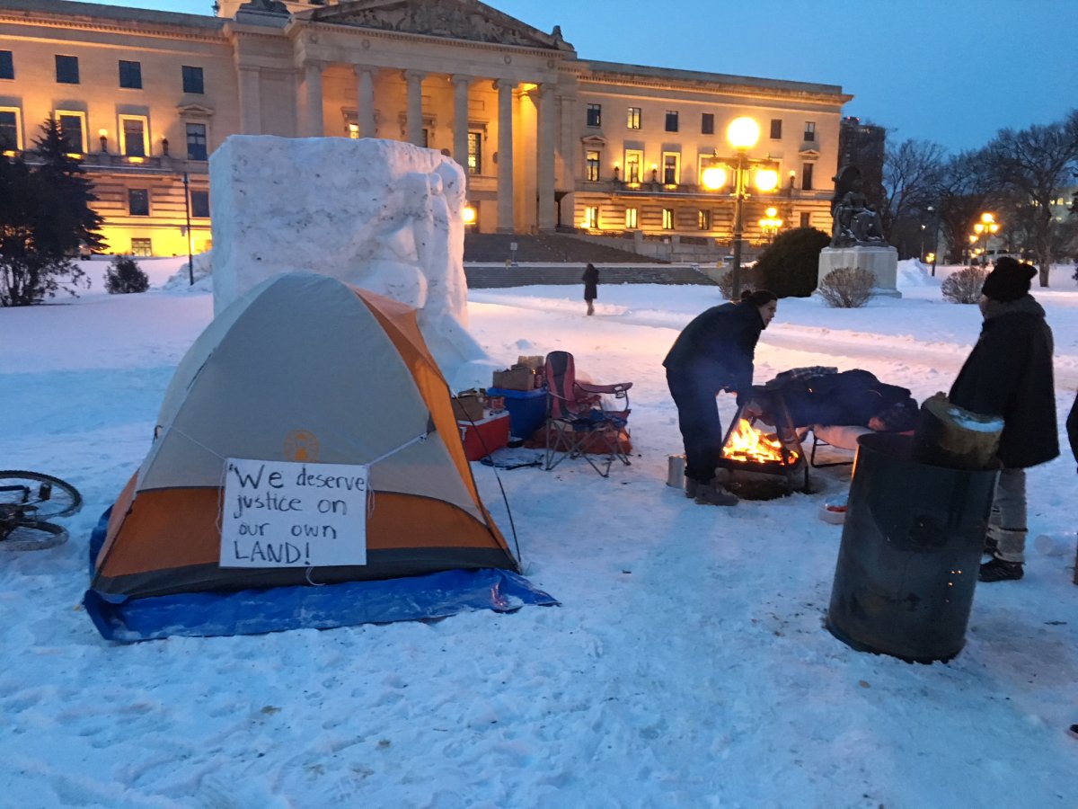 Several people gathered outside the Manitoba Legislative Building starting Thursday night asking for change to the way Indigenous people are treated by the justice system. 