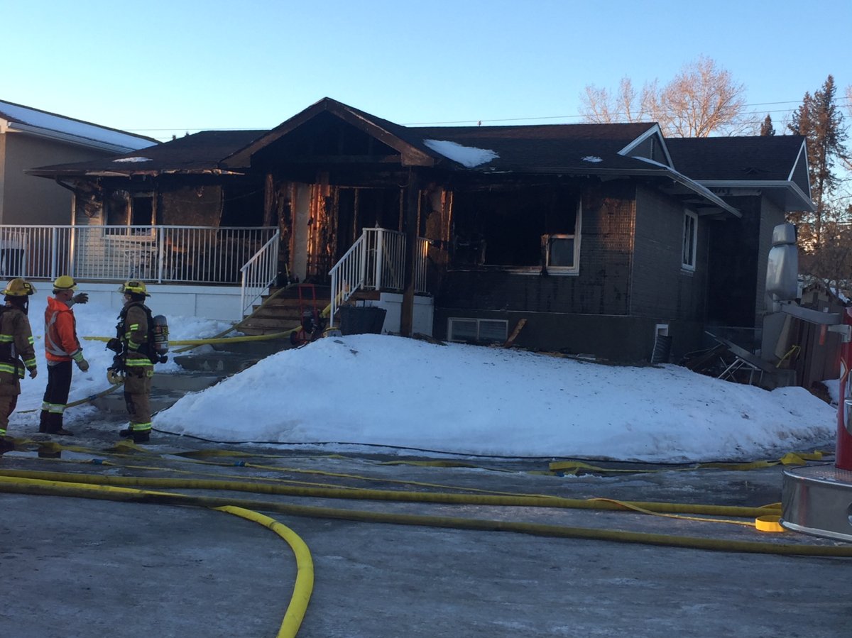 Calgary firefighters on scene of a house fire on Pineside Place N.E. on Tuesday, Feb. 27. 