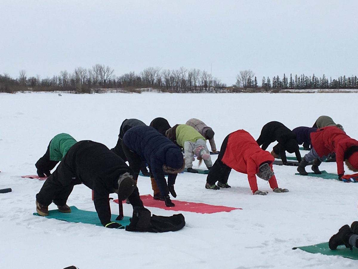 About two dozen people tried yoga on the ice at FortWhyte Alive on Saturday.