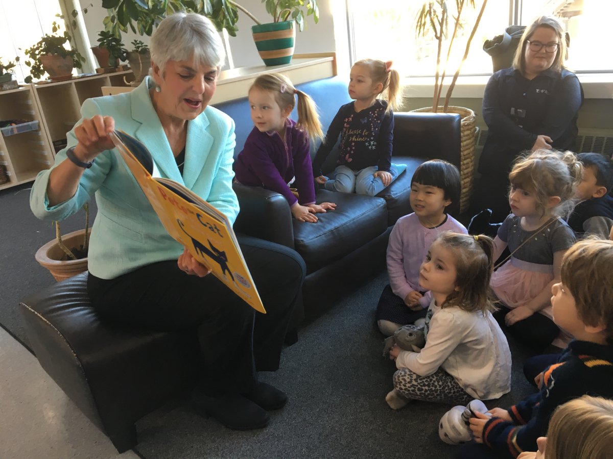 B.C. Finance Minister Carole James reads to a group of 3 and 4 years old.
