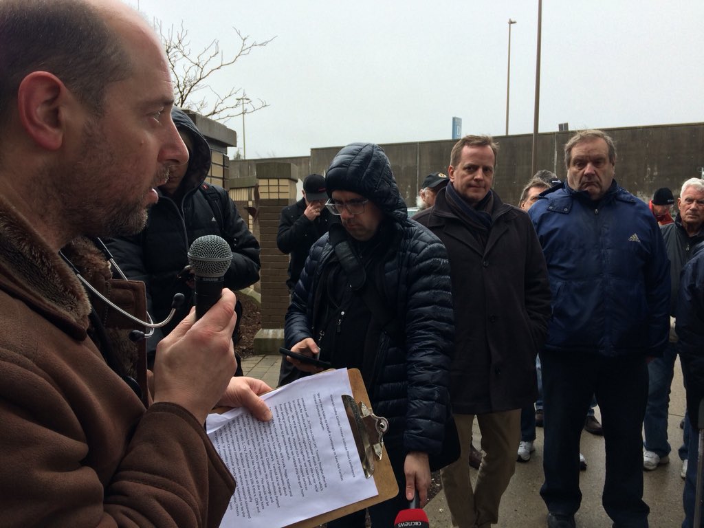 Jeff Hanks, co-chair of the London Health Coalition, addresses a few dozen people during a campaign to save the Cardiac Fitness Institute.
