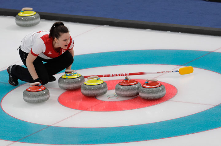 Switzerland's Jenny Perret makes a call during the mixed doubles semi-final curling match against Russian athletes Anastasia Bryzgalova and Aleksandr Krushelnitckii at the 2018 Winter Olympics in Gangneung, South Korea, Monday, Feb. 12, 2018. 