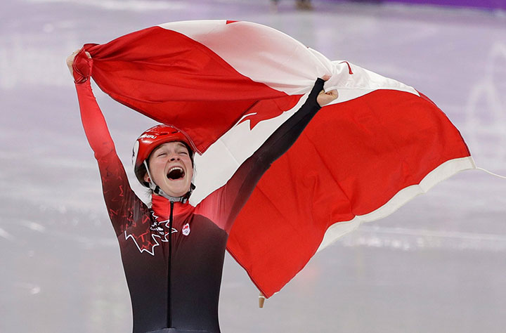 Canada’s Kim Boutin celebrates after winning the bronze medal in the women’s 1500 metres short track speedskating final in the Gangneung Ice Arena at the 2018 Winter Olympics in South Korea, Feb. 17, 2018.