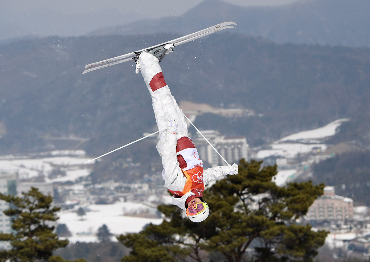 Canada's Mikael Kingsbury of Deux-Montagnes, Que. jumps during a men's freestyle moguls qualification run at the Phoenix Snow Park at the 2018 Winter Olympic Games in Pyeongchang, South Korea, Friday, Feb. 9, 2018. 