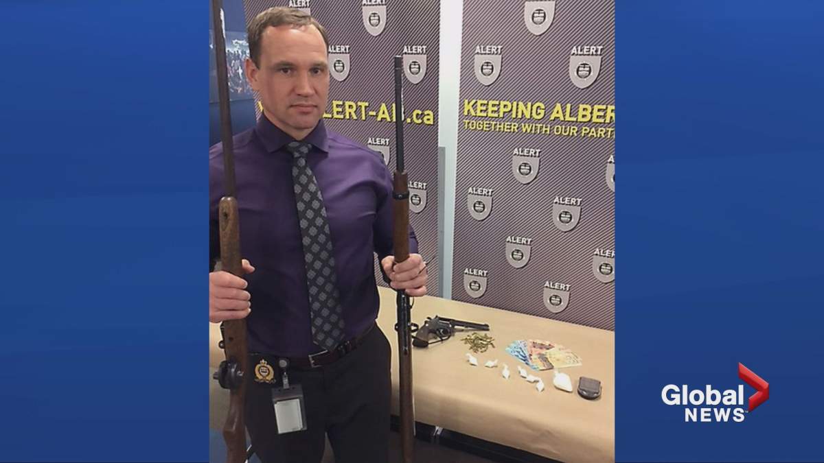 Police display three firearms and some illegal drugs seized on Tuesday in Medicine Hat.