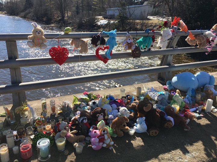 Memorial for three-year-old Kaden Young on the Bridge at Mill & Station Streets.