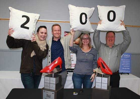 The Mortlock family (from left) Ashley Mortlock, Craig Mortlock, Jennifer Kennedy and Tom Mortlock – celebrate their top fundraising efforts.
