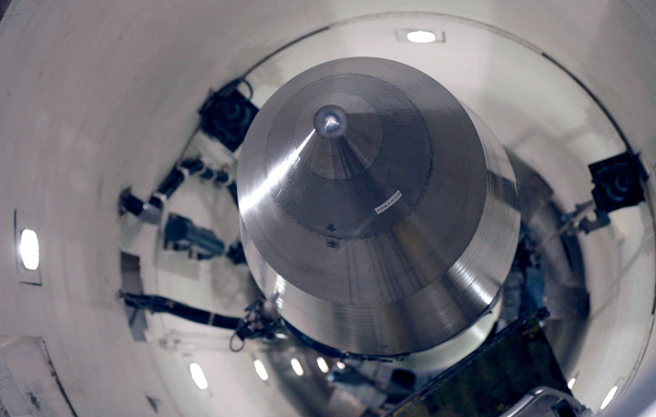 In this file photo taken June 25, 2014, an inert Minuteman 3 missile is seen in a training launch tube at Minot Air Force Base, N.D. The base is tasked with maintaining 150 of the nuclear-tipped missiles spread out across the North Dakota countryside and keeping them ready to launch at a moment's notice as part of the U.S.' nuclear defense strategy. 
