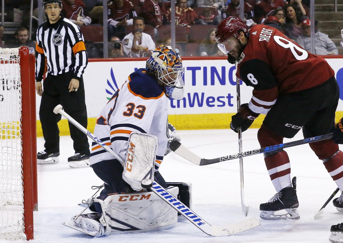 Arizona Coyotes right wing Tobias Rieder has his shot turned away by Edmonton Oilers goaltender Cam Talbot during the second period of an NHL hockey game Saturday, Feb. 17, 2018, in Glendale, Ariz. (AP Photo/Ross D. Franklin).