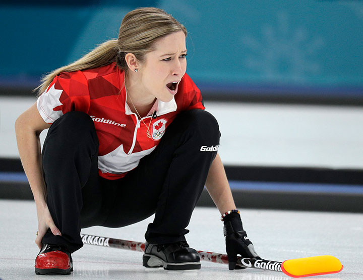 Canada's Kaitlyn Lawes shouts instructions to her teammate during their mixed doubles curling match against Switzerland at the 2018 Winter Olympics in Gangneung, South Korea, Feb. 10, 2018. 