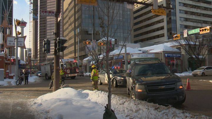 Police are investigating after an 83-year-old man was sent to hospital with life-threatening injuries when he was hit by a pickup truck while trying to walk across a downtown Calgary street on Tuesday morning.