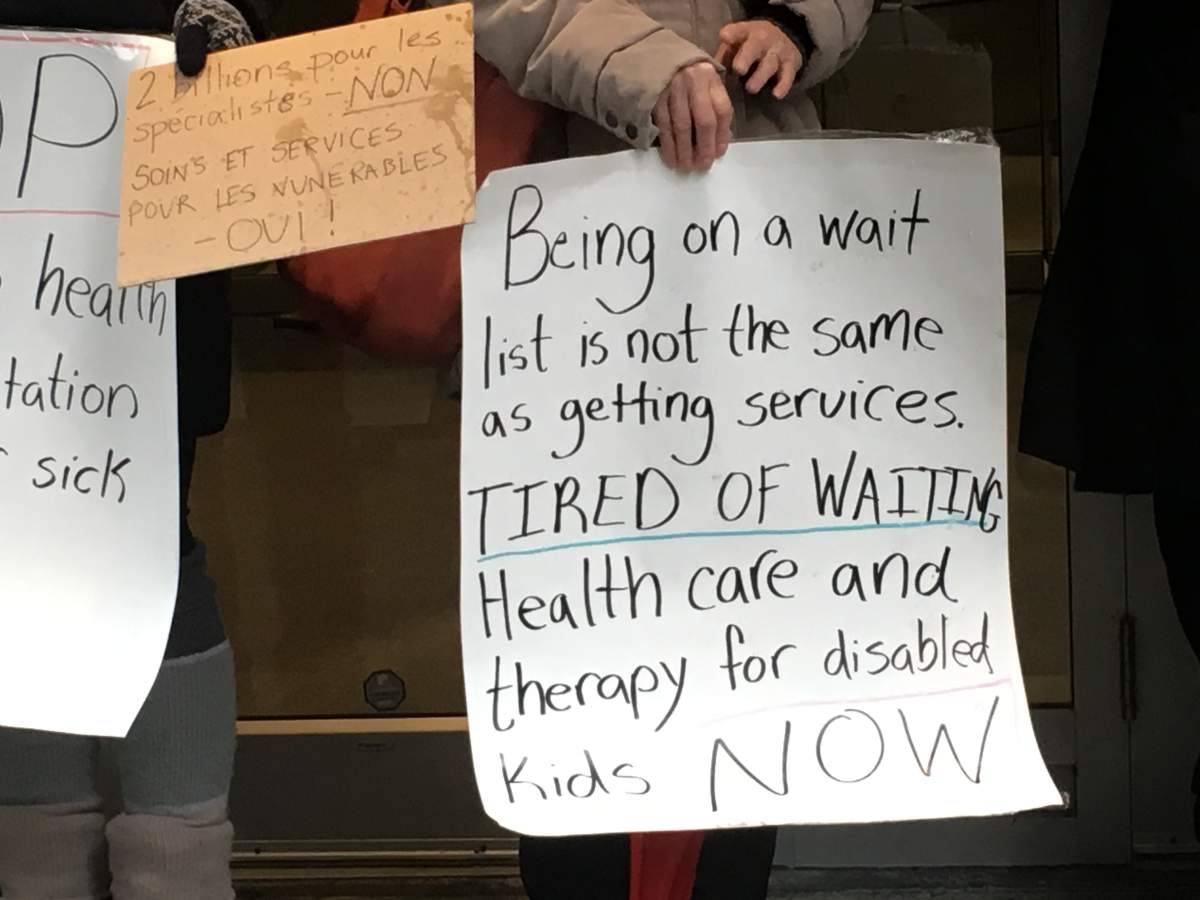 Parents protest for autism services.