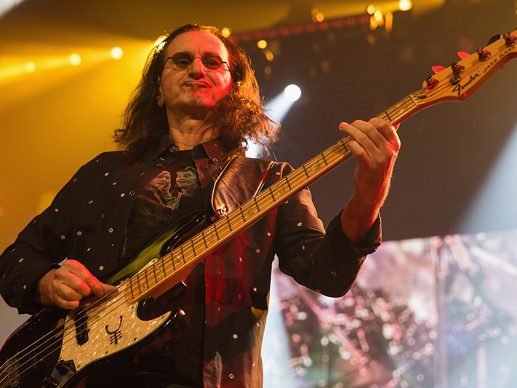 Geddy Lee of Rush performs on stage during the R40 LIVE Tour at KeyArena on July 19, 2015 in Seattle, Wash.