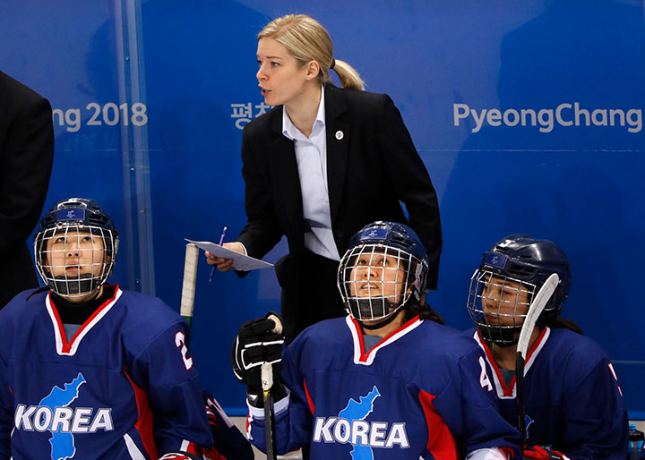 Korea’s head coach Sarah Murray watches on during a preliminary round match against Sweden at the Kwandong Hockey Centre, Gangneung, South Korea on Feb. 12, 2018. 