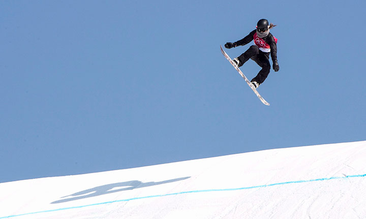 Canada's Spencer O'Brien takes to the air for her third jump during the women's big air competition at the Pyeongchang Winter Olympic Games on Feb. 22, 2018 in Pyeongchang. 