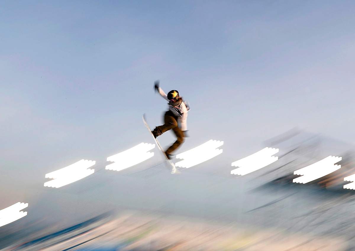 Canada’s Spencer O’ Brien soars through the air during the snowboard women’s World Cup big air event, in Rho, near Milan, Italy, Saturday, Nov. 11, 2017.