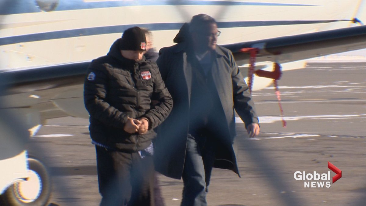Stephane Parent arrived at the Calgary International Airport on Monday, Feb. 19, 2018, escorted by the RCMP.