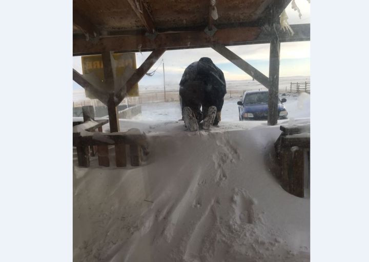 Snowdrifts blocking the entrance to a home in Brocket, Alberta Saturday.