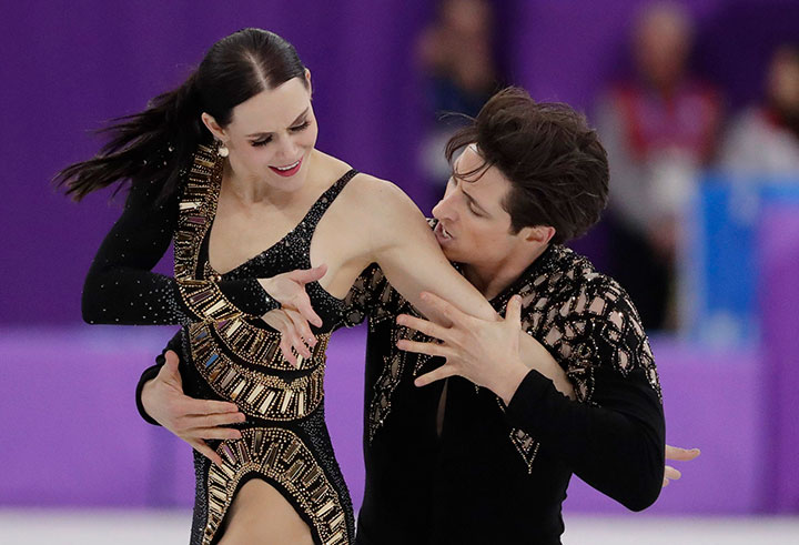 Canada’s Tessa Virtue and Scott Moir perform during the ice dance short team event in the Gangneung Ice Arena at the 2018 Winter Olympics in Gangneung, South Korea, Feb. 11, 2018. 
