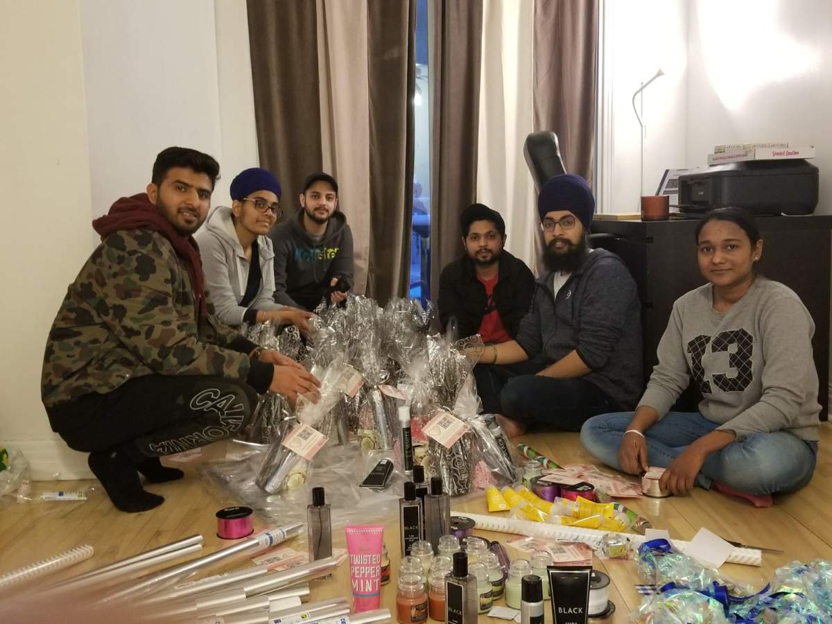 Volunteers assembling care packages. Sunday February 11, 2018. 