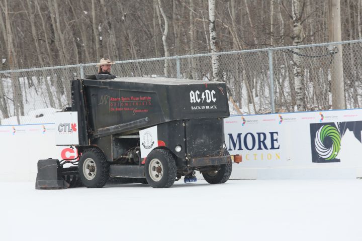 Brent Saik drives the zamboni at the World's Longest Hockey Game at Saiker's Acres Tuesday, Feb. 13, 2018. 
