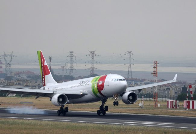 A June 11, 2015 file photo shows a TAP Air Portugal airliner landing at Lisbon international airport.