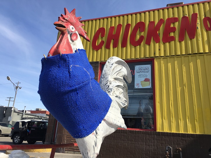 ACAD students have clothing fitting for the chicken statue outside of Kensington’s Chicken on the Way.